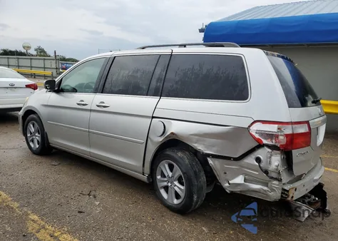 2009 Honda Odyssey Touring z USA, uszkodzony, nr VIN 5FNRL389X9B004784
